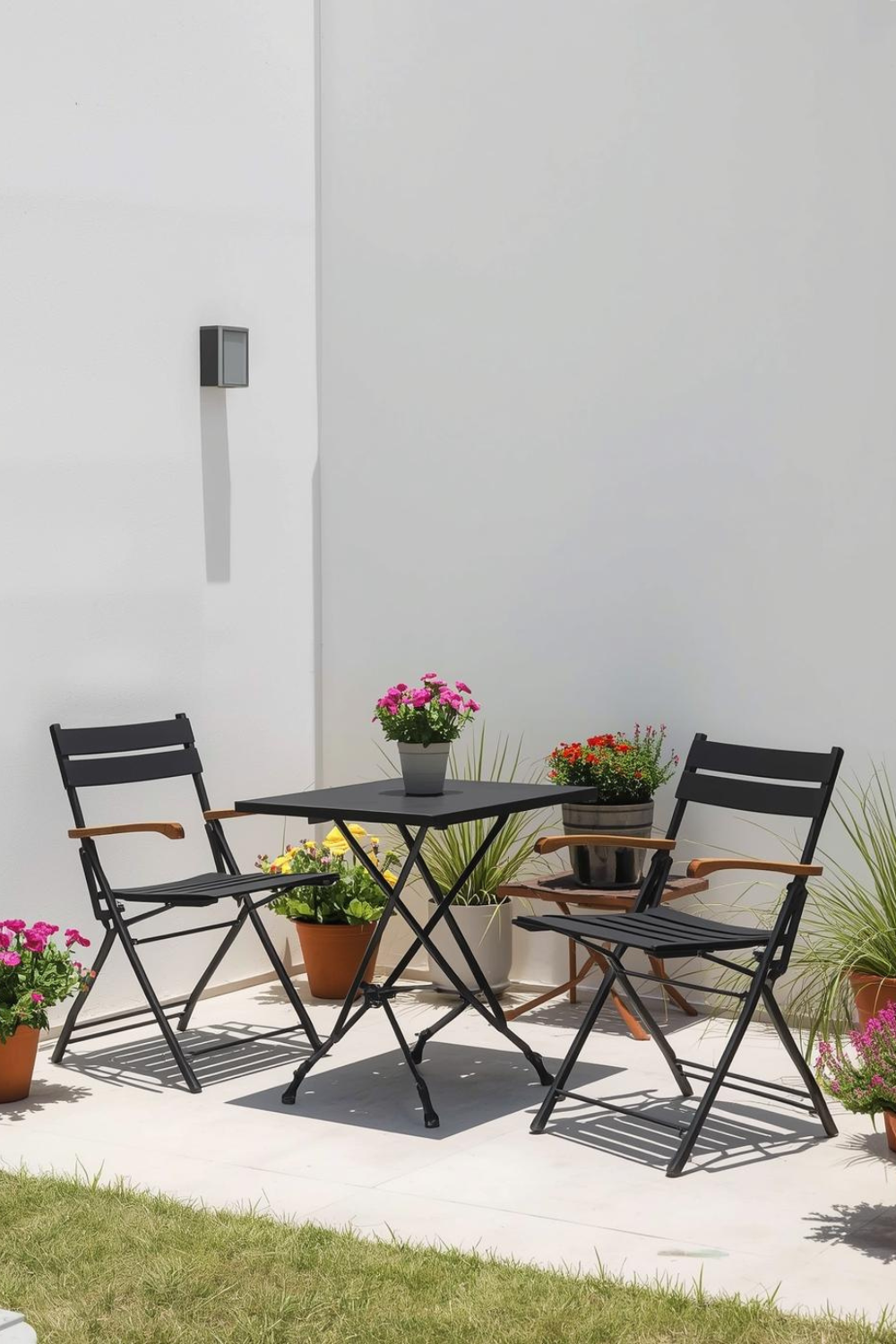 Outdoor patio set with flowers and chairs