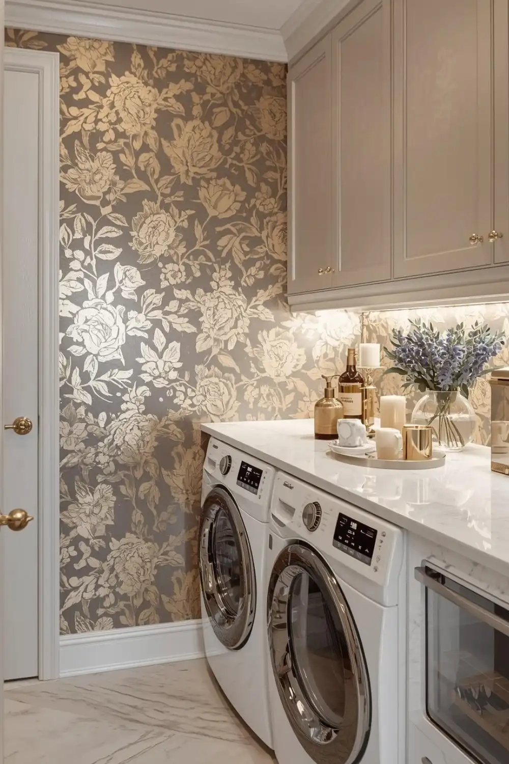 Elegant laundry room with floral wallpaper.