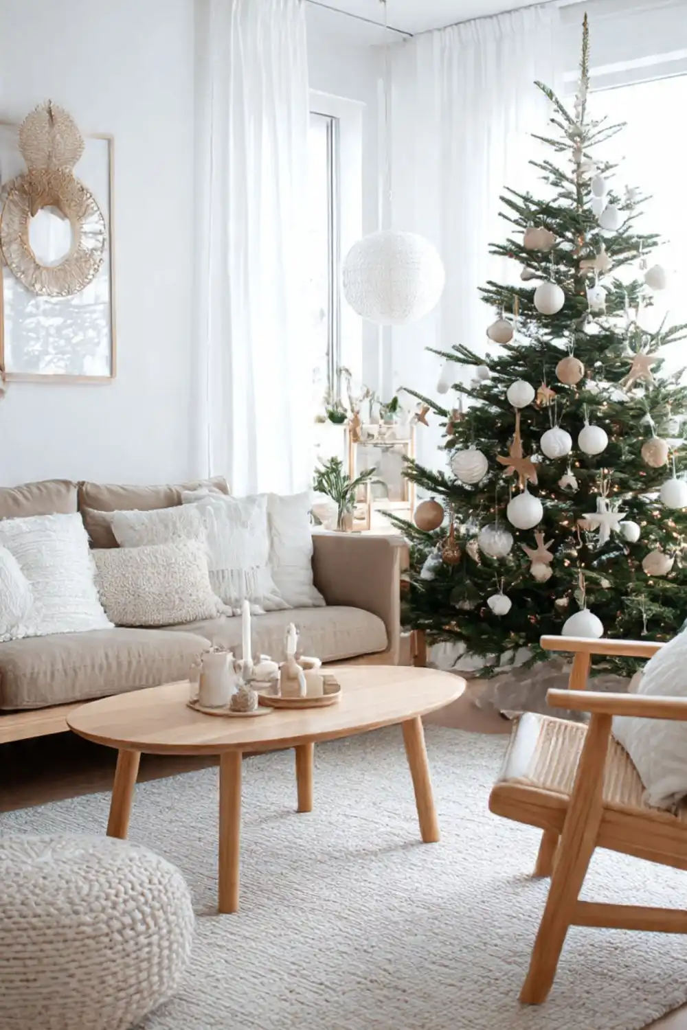 Cozy living room with Christmas tree and decorations.